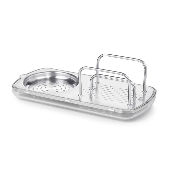 Under the kitchen sink. My OXO container holds dishwasher pods. Command  hook and scarf hanger hold g…